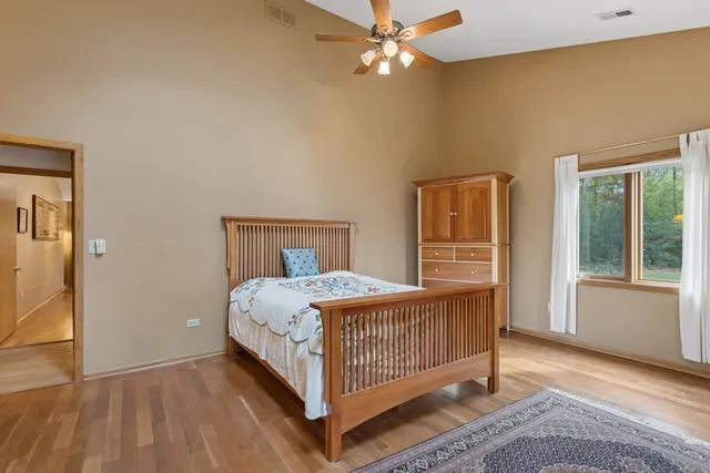 a bathroom with a sink a mirror and a toilet