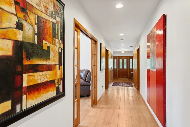 a kitchen with a stove a sink and a refrigerator