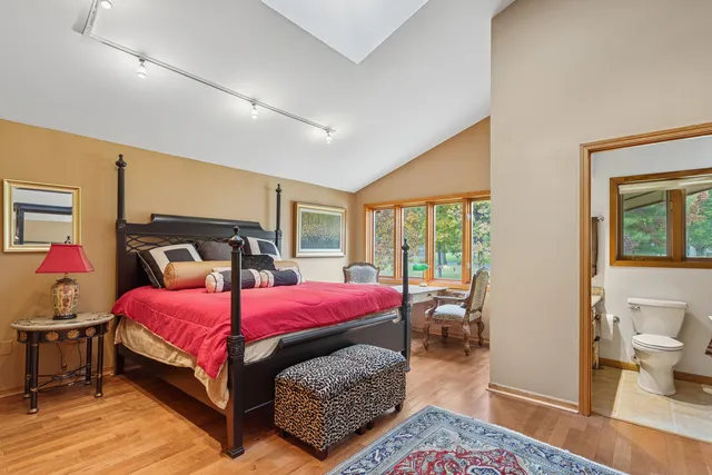 a living room with fireplace furniture and a fireplace