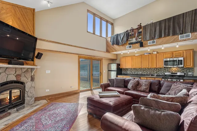 a view of a deck with a yard