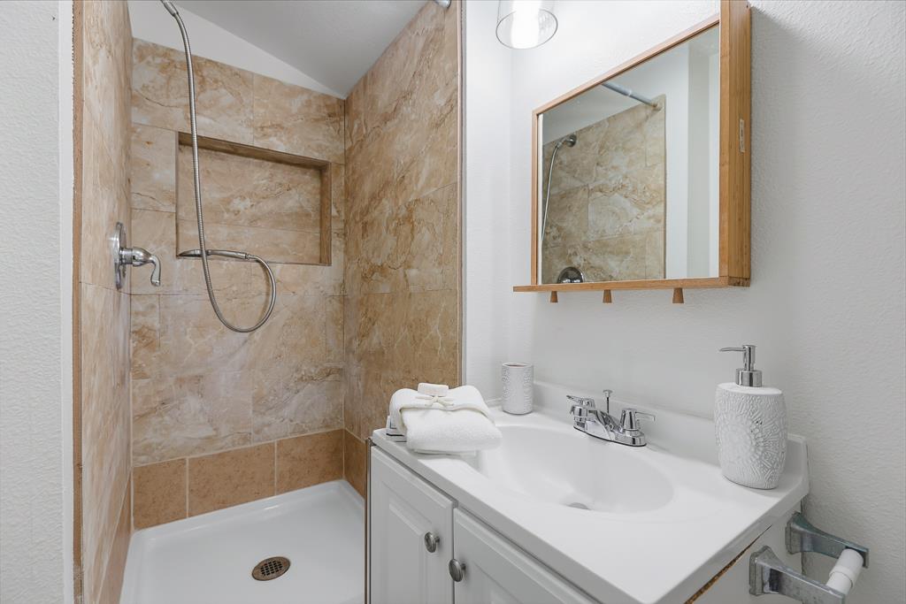 2675 Leeward Street Hayward, CA 94545 - Photo 29 of 75 a bathroom with a sink toilet and shower