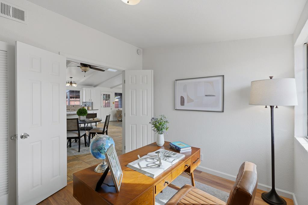 2675 Leeward Street Hayward, CA 94545 - Photo 34 of 75 a view of a workspace with furniture and a livingroom