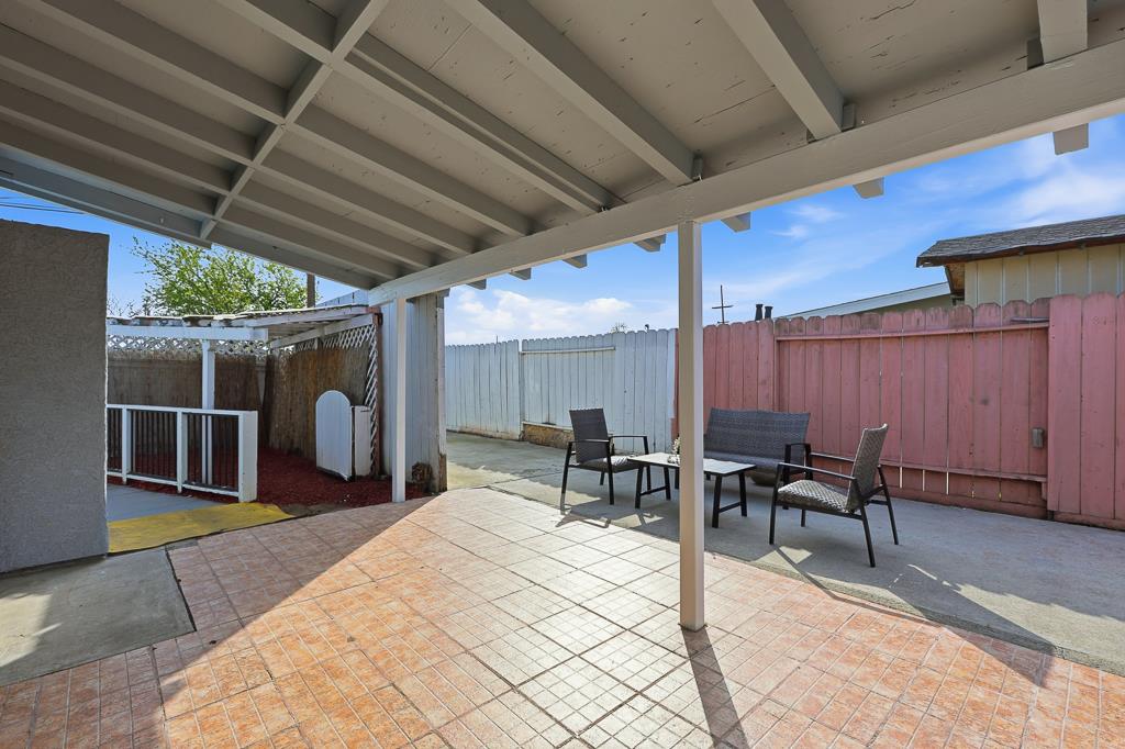 2675 Leeward Street Hayward, CA 94545 - Photo 59 of 75 a patio with a table and chairs