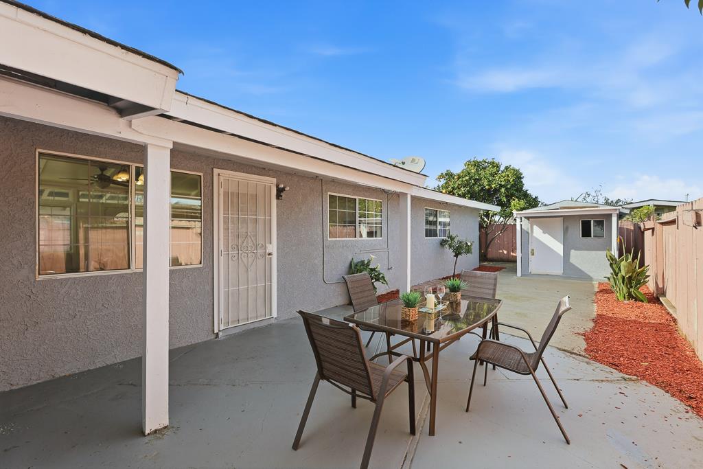 2675 Leeward Street Hayward, CA 94545 - Photo 62 of 75 a view of a patio with table and chairs and potted plants