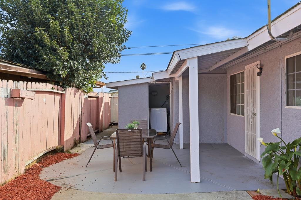 2675 Leeward Street Hayward, CA 94545 - Photo 63 of 75 a view of a patio with table and chairs and potted plants