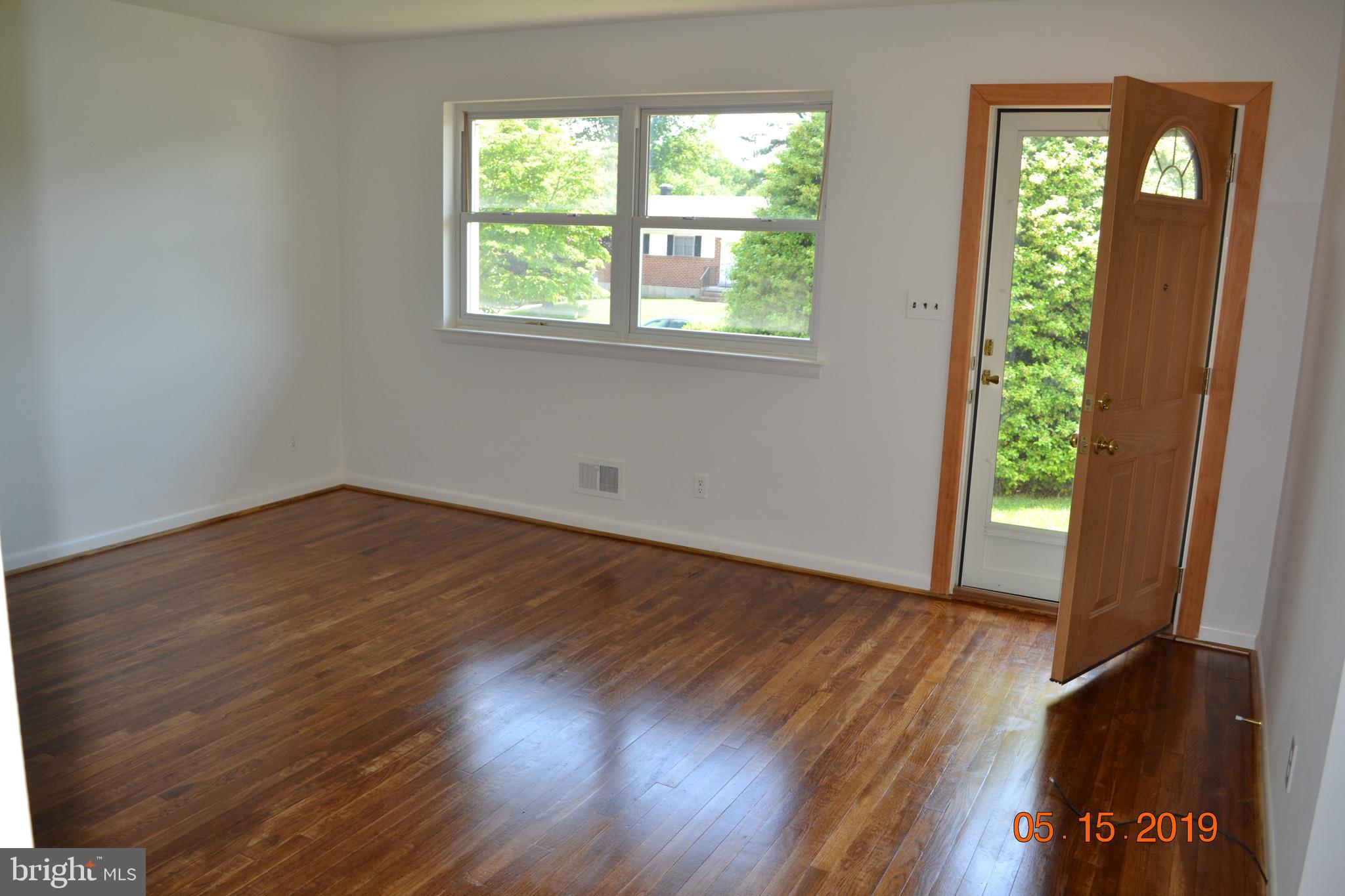 3812 Offutt Road Randallstown, MD 21133 - Photo 22 of 58 Living room 15' x 14'