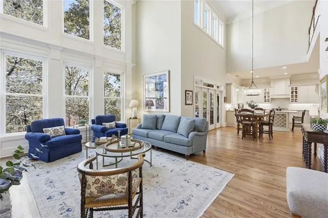 a bedroom with a bed couch and a window