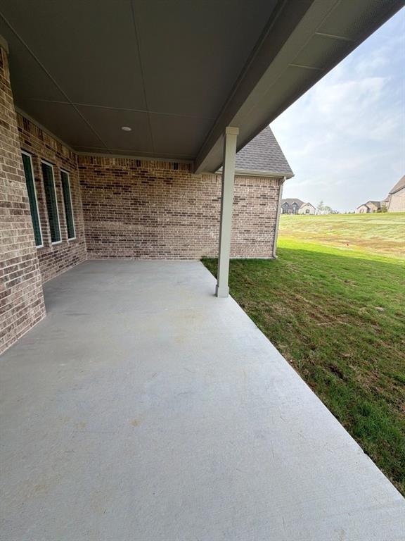 906 Perrin Lane Van Alstyne, TX 75495 - Photo 12 of 14 a view of a terrace with sky view