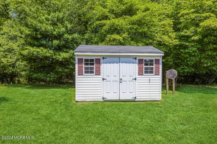 20 Westbrook Road Howell, NJ 07731 - Photo 2 of 6 a view of a house with a yard