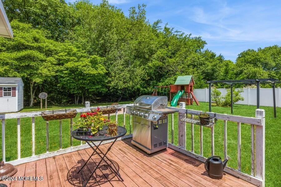 20 Westbrook Road Howell, NJ 07731 - Photo 3 of 6 a view of a chair and tables front of the house