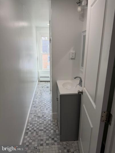 37 Bridge Street, Unit 501 Phoenixville, PA 19460 - Photo 22 of 38 a bathroom with a sink and mirror with toilet