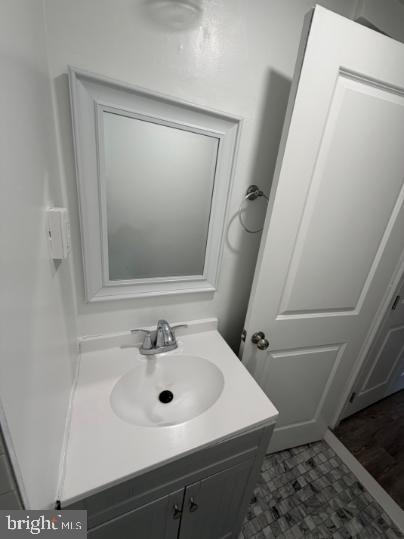 37 Bridge Street, Unit 501 Phoenixville, PA 19460 - Photo 24 of 38 a bathroom with a sink toilet and mirror