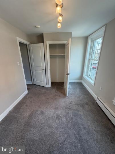 37 Bridge Street, Unit 501 Phoenixville, PA 19460 - Photo 29 of 38 an empty room with a fireplace and windows