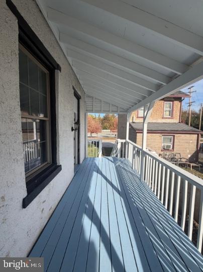 37 Bridge Street, Unit 501 Phoenixville, PA 19460 - Photo 3 of 38 a view of a balcony with wooden floor