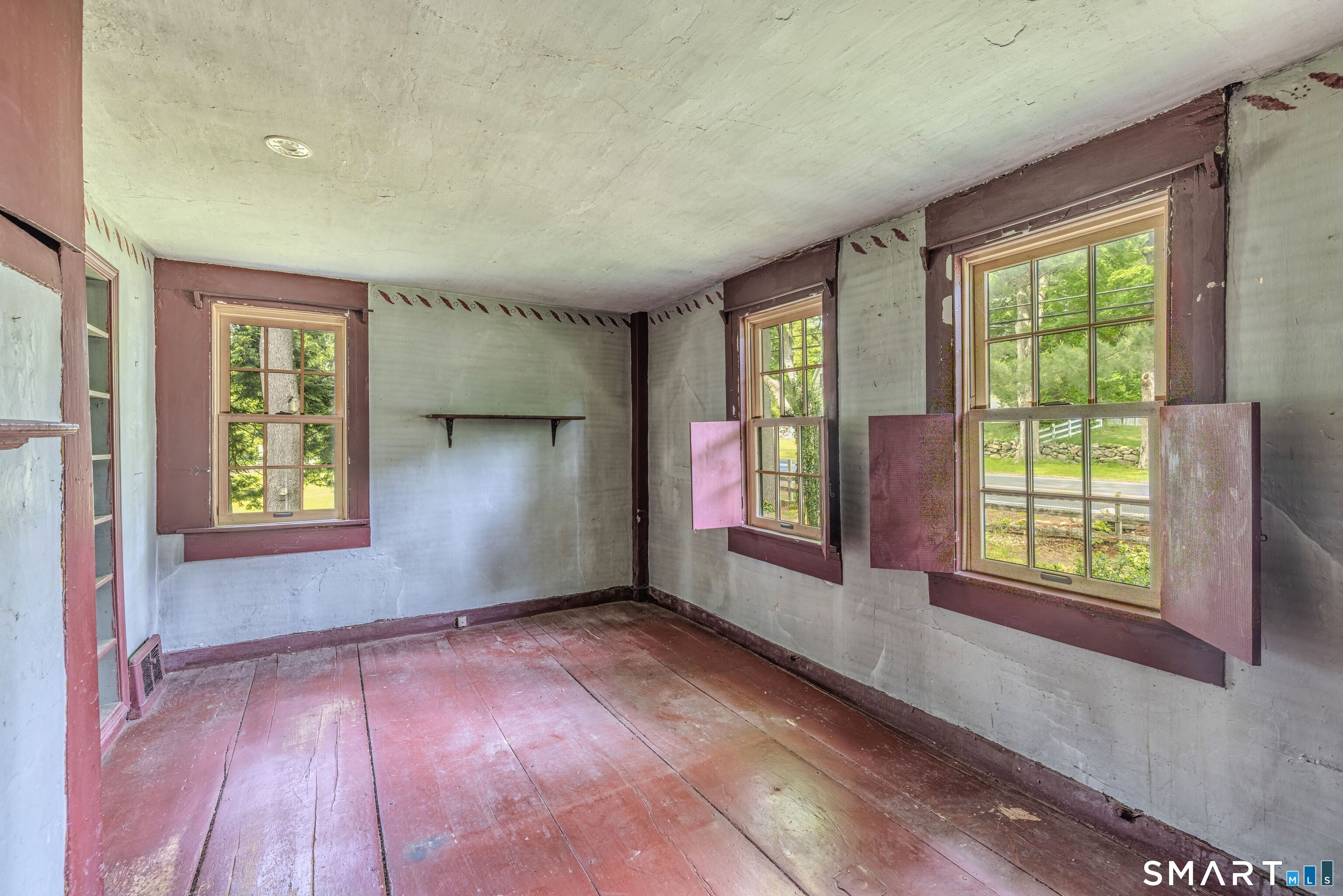 261 Hebron Road Bolton, CT 06043 - Photo 17 of 40 an empty room with windows