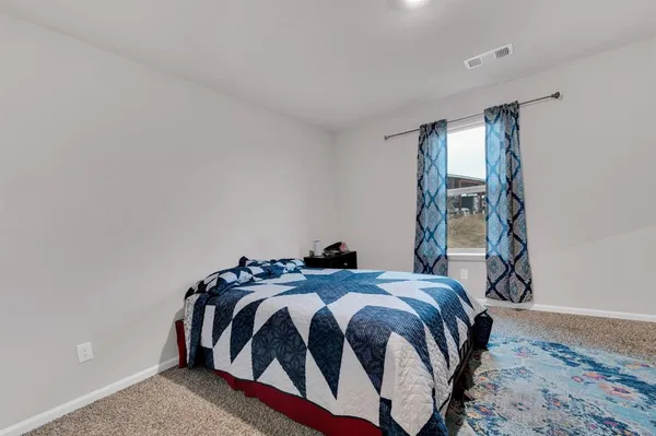 a room with furniture and a couch