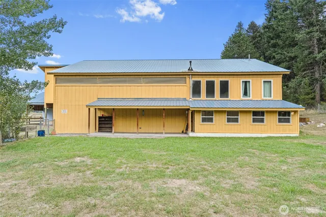 a view of hallway with a large window