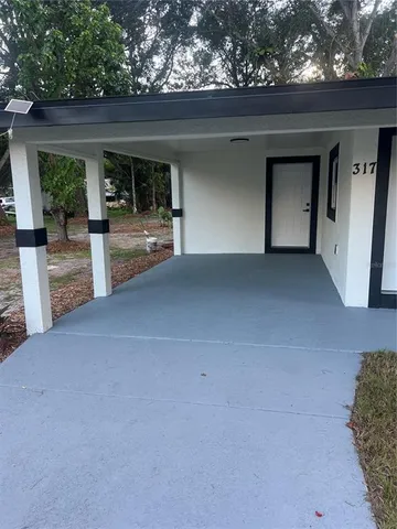 front view of a house with a street