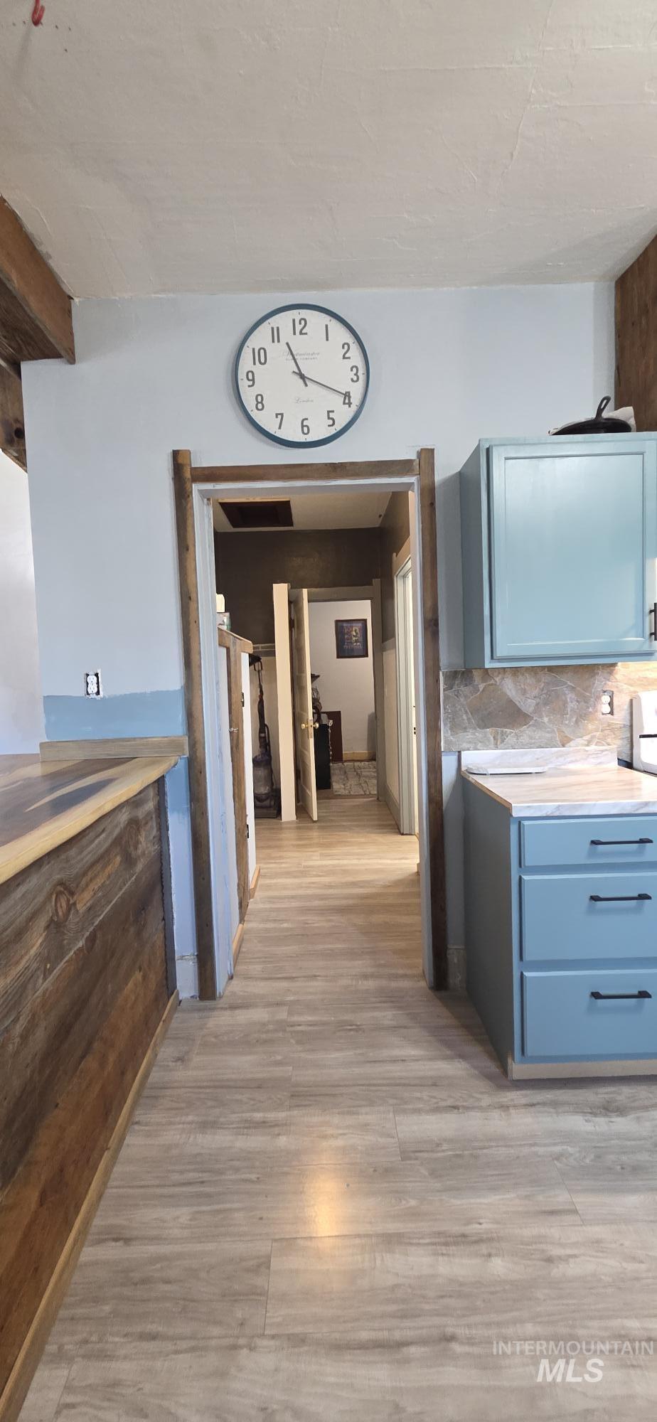 1673 Main Street Pomeroy, WA 99347 - Photo 12 of 26 Hallway featuring light wood-style flooring