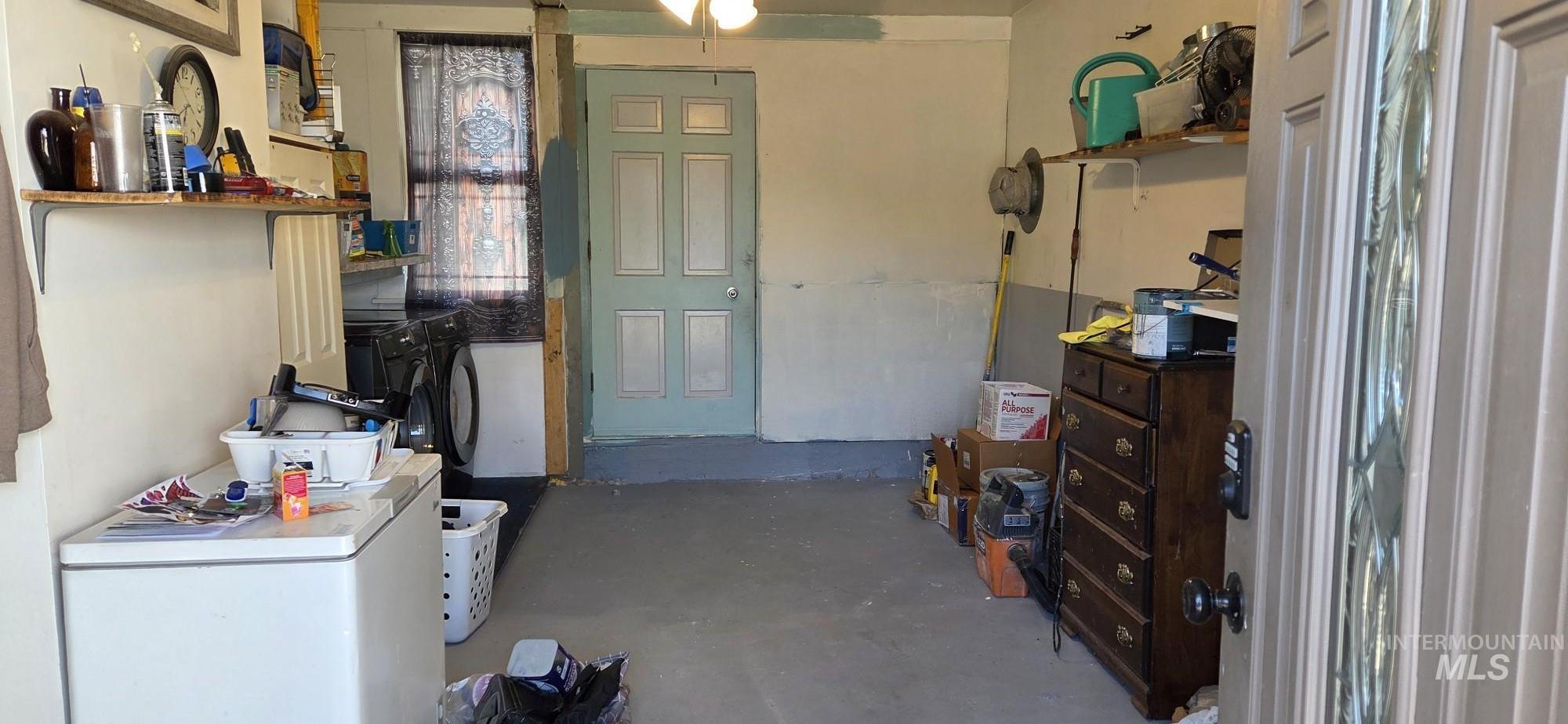 1673 Main Street Pomeroy, WA 99347 - Photo 20 of 26 Foyer featuring unfinished concrete flooring and washer / clothes dryer