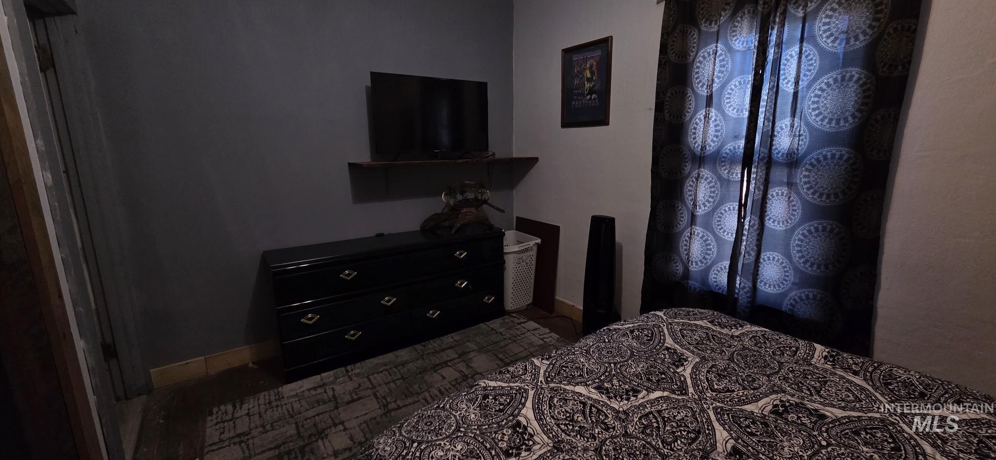 1673 Main Street Pomeroy, WA 99347 - Photo 23 of 26 Bedroom featuring baseboards