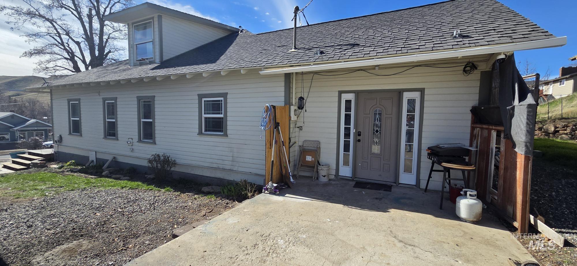 1673 Main Street Pomeroy, WA 99347 - Photo 4 of 26 Rear view of house featuring a shingled roof