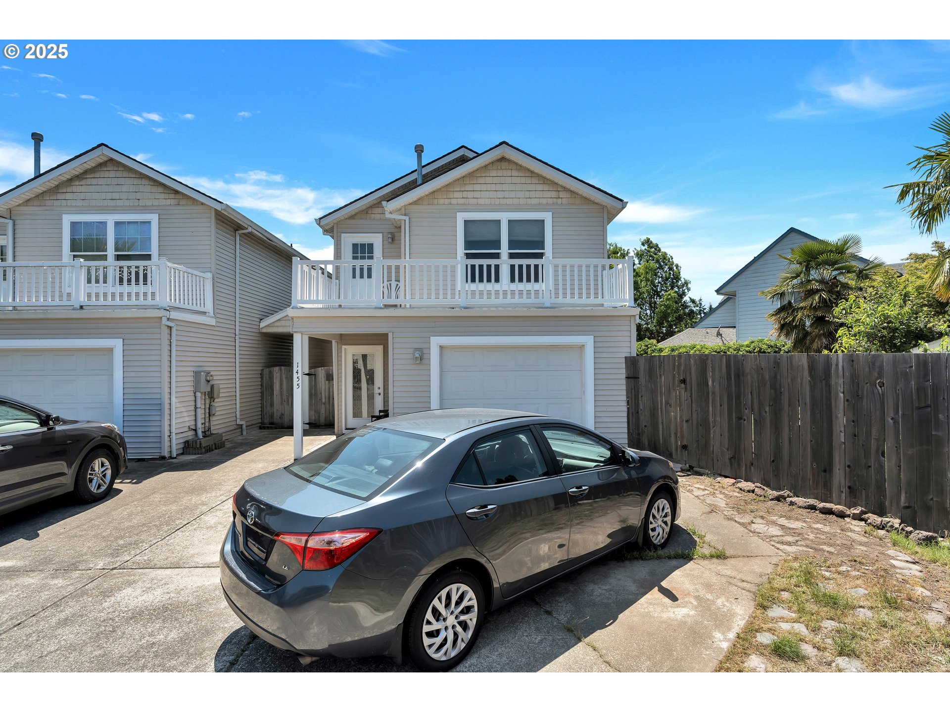 1455 Northeast Jessica Loop Hillsboro, OR 97124 - Photo 1 of 39 a car parked in front of a house