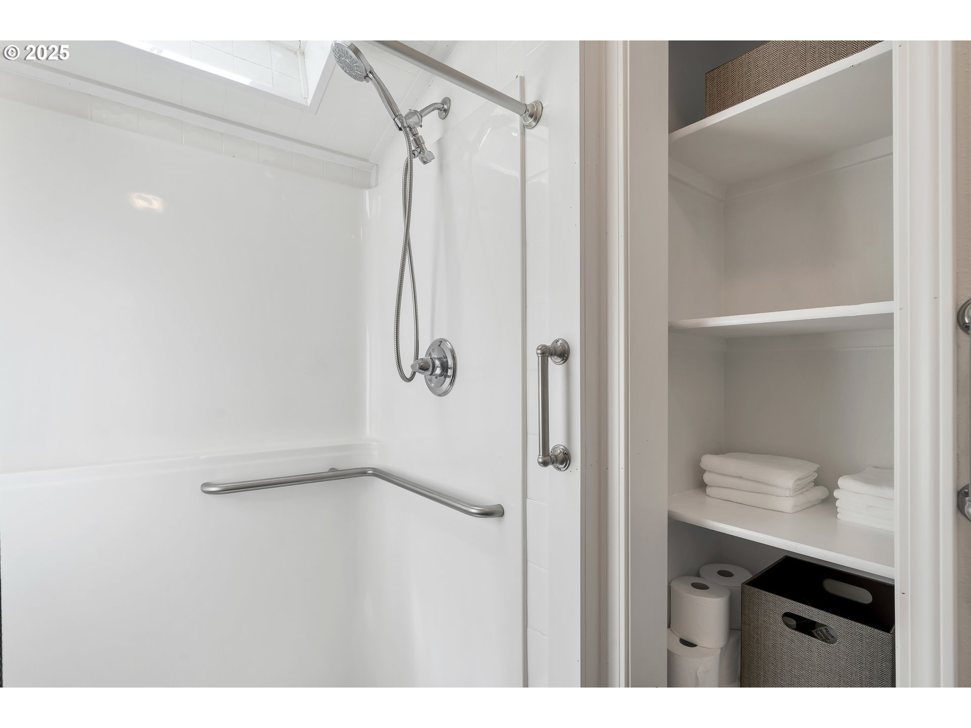 1455 Northeast Jessica Loop Hillsboro, OR 97124 - Photo 14 of 39 a bathroom with a shower and a sink