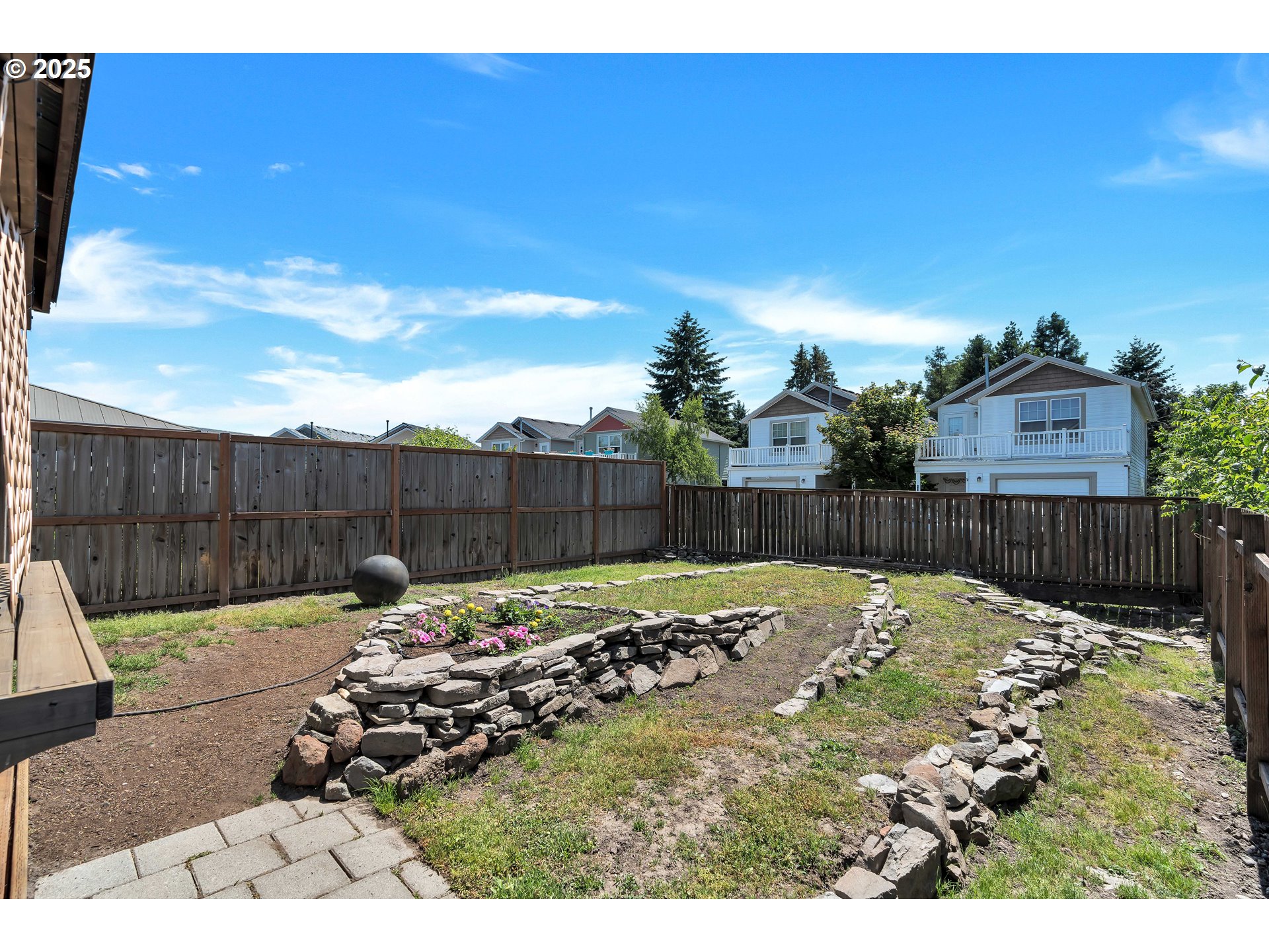 1455 Northeast Jessica Loop Hillsboro, OR 97124 - Photo 35 of 39 a view of a backyard with a slide