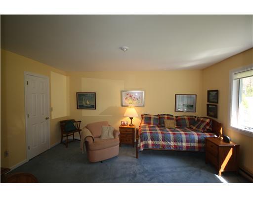 15 West Harbor Pond Road, Unit 15D West Boothbay Harbor, ME 04575 - Photo 7 of 10 Bedroom. First floor bedroom with...