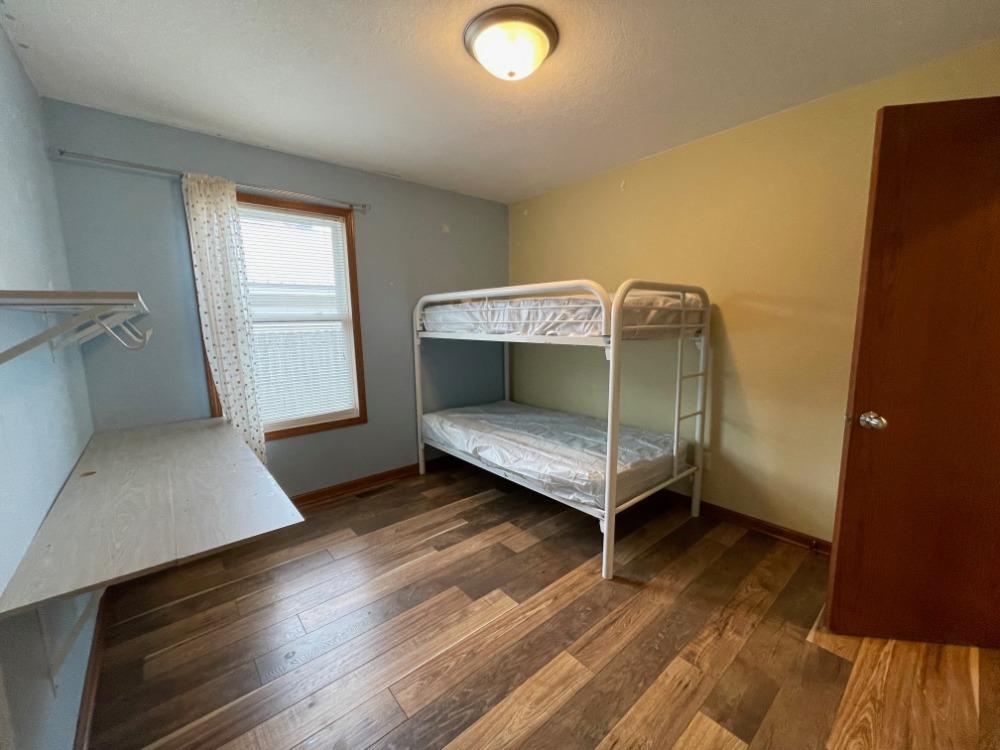 924 8th Avenue Rochelle, IL 61068 - Photo 30 of 66 a bedroom with a bed and a window