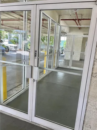 a view of a glass door with a glass door and a glass door