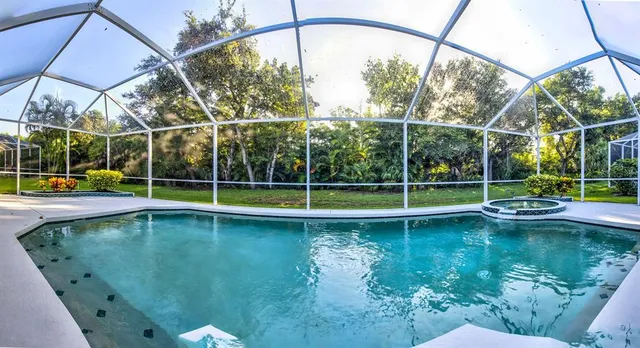 a view of a swimming pool with a lake view