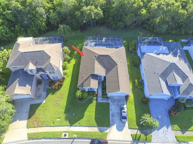 a view of kitchen with furniture and refrigerator