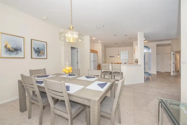 a view of a dining room with furniture