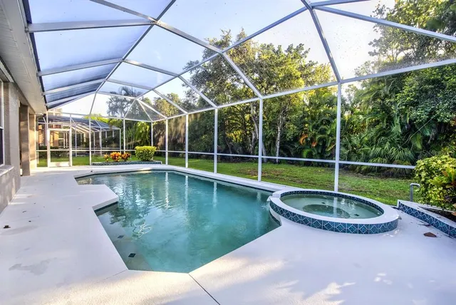 a view of a house with swimming pool
