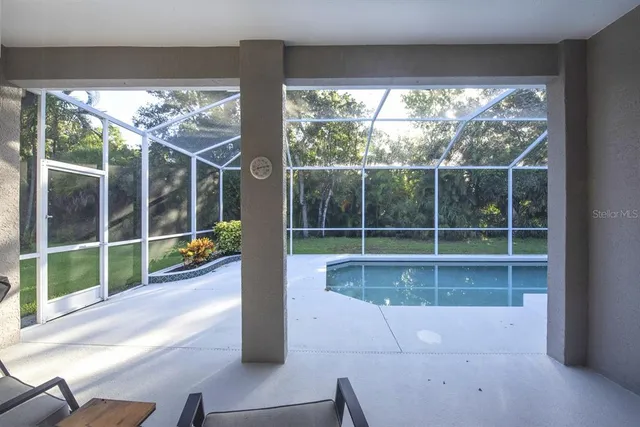 a view of an outdoor space and tennis court