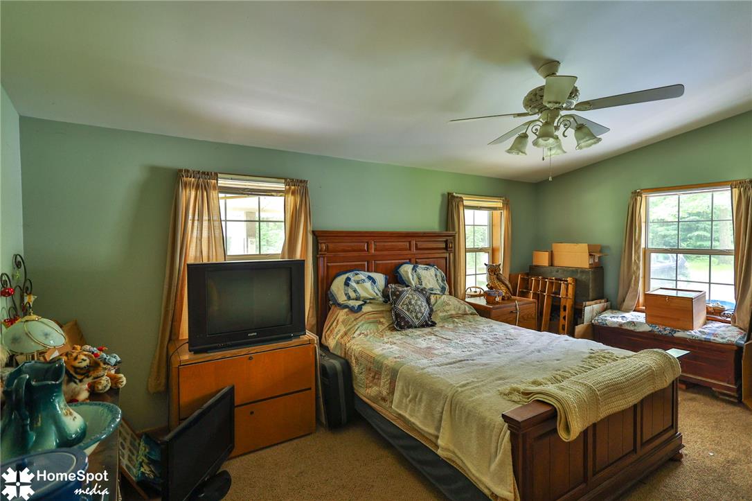 3795 Rhoades Road Kempton, PA 19529 - Photo 21 of 42 A comforting retreat awaits, complete with soft, textured carpet and abundant natural light from multiple windows.