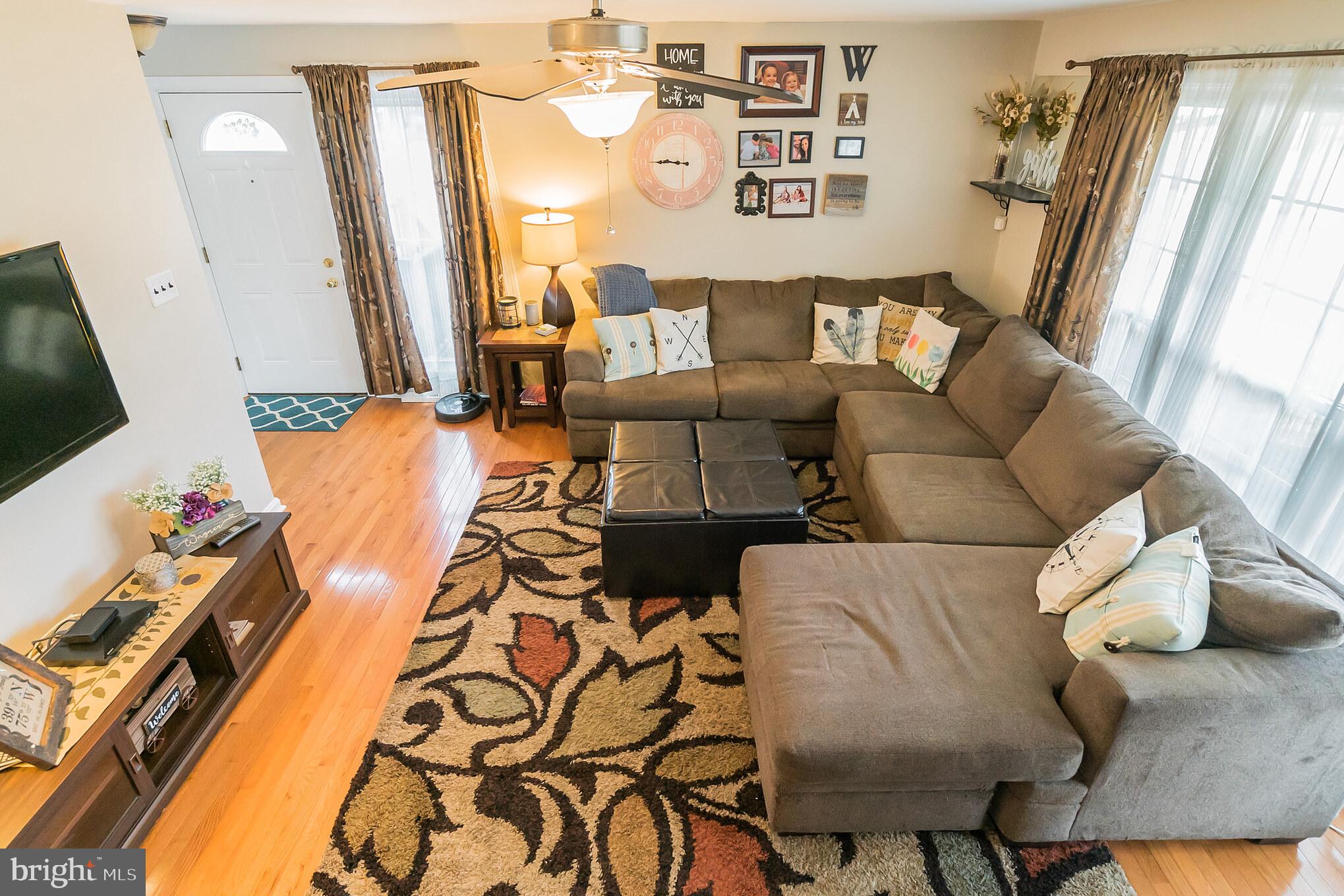 1432 Parklane Road Swarthmore, PA 19081 - Photo 6 of 19 a living room with furniture and a flat screen tv