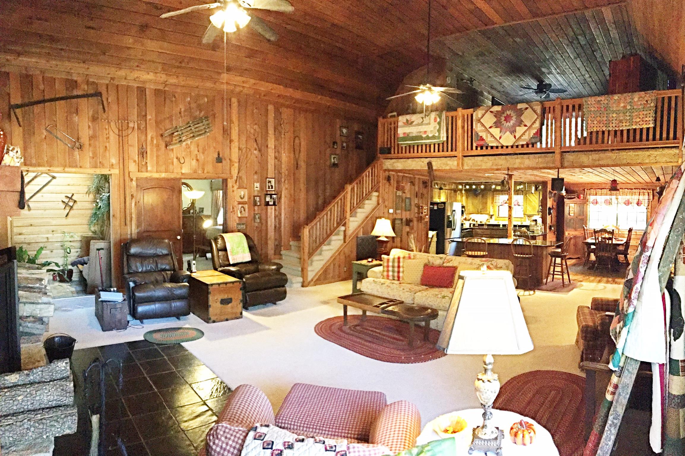 2731 New Hall Road Greenbrier, TN 37073 - Photo 11 of 30 a living room with furniture and a chandelier