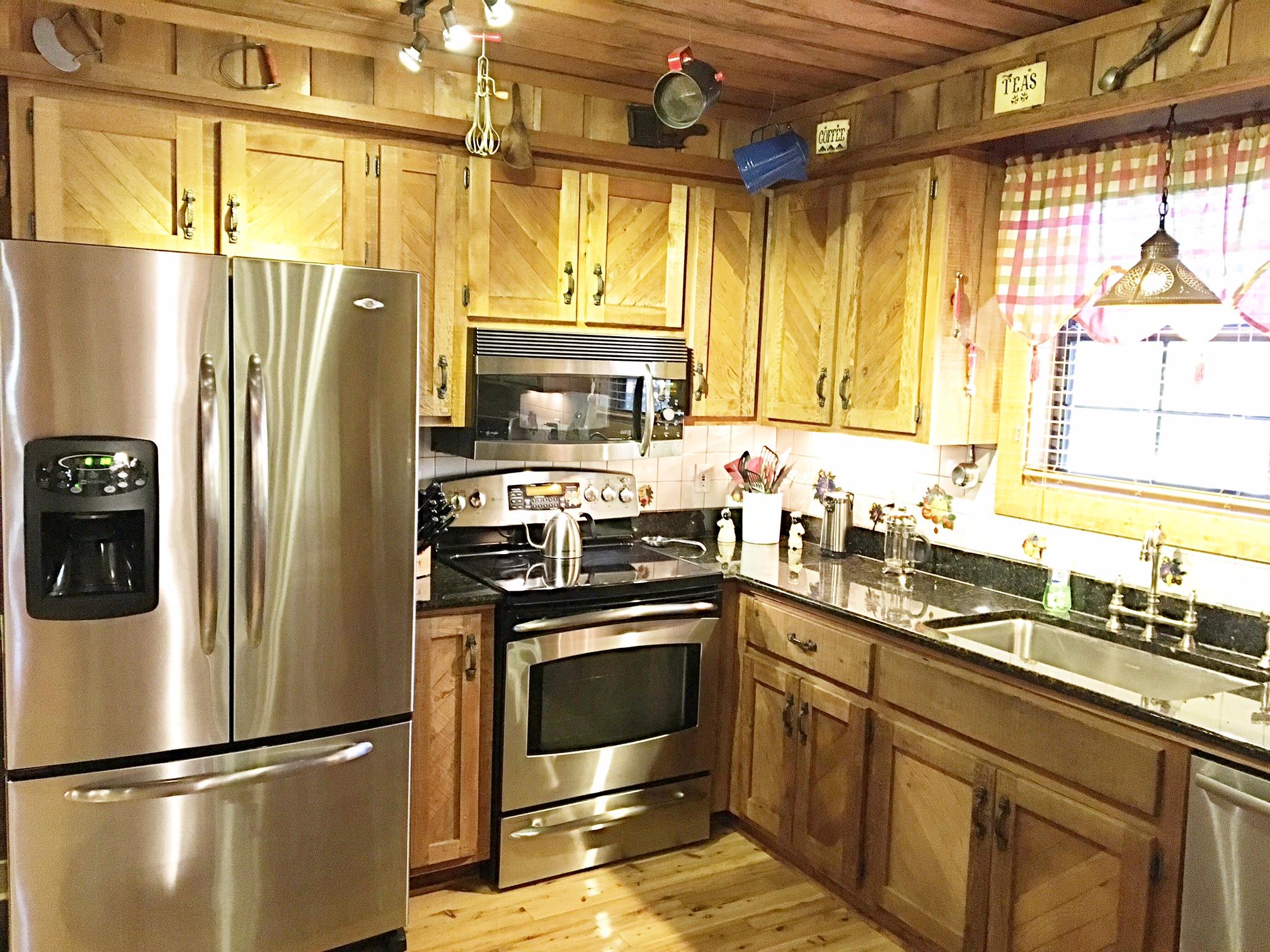 2731 New Hall Road Greenbrier, TN 37073 - Photo 14 of 30 a kitchen with stainless steel appliances a refrigerator and a sink