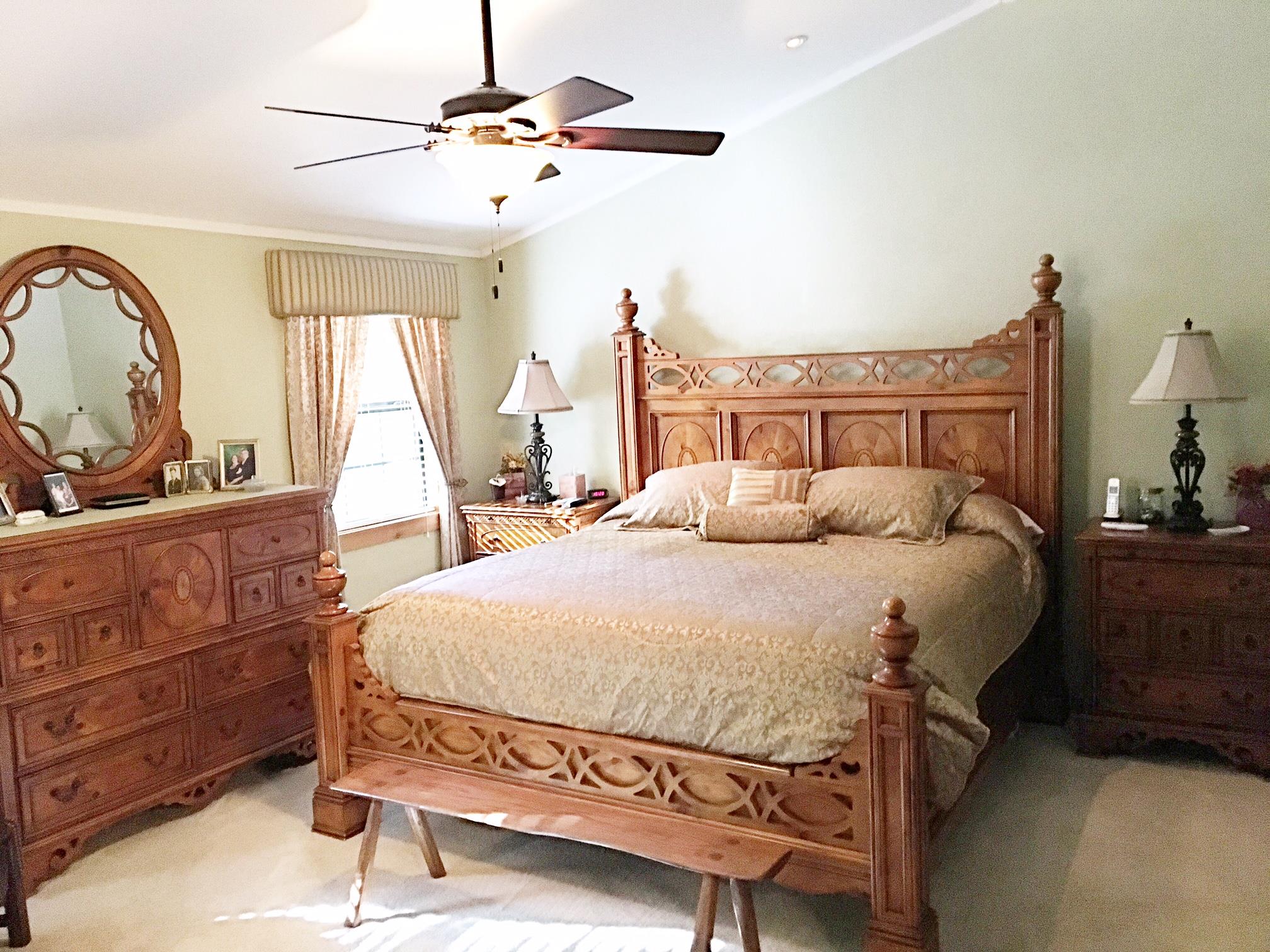 2731 New Hall Road Greenbrier, TN 37073 - Photo 17 of 30 a bed sitting in a bedroom next to a window