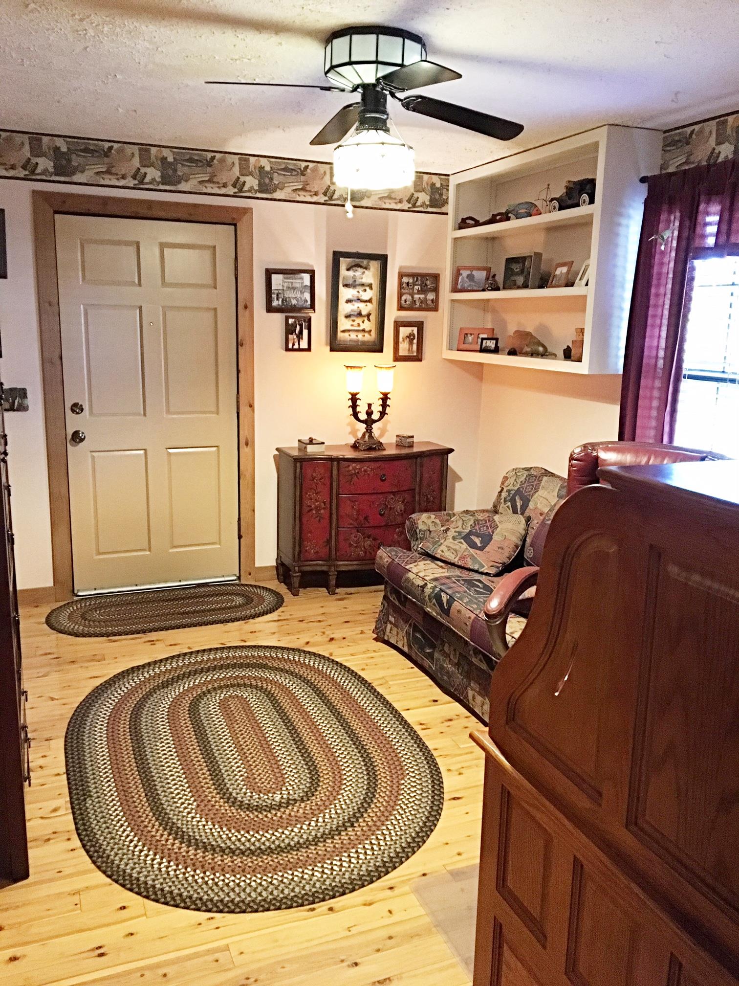 2731 New Hall Road Greenbrier, TN 37073 - Photo 24 of 30 a living room with furniture and a fireplace