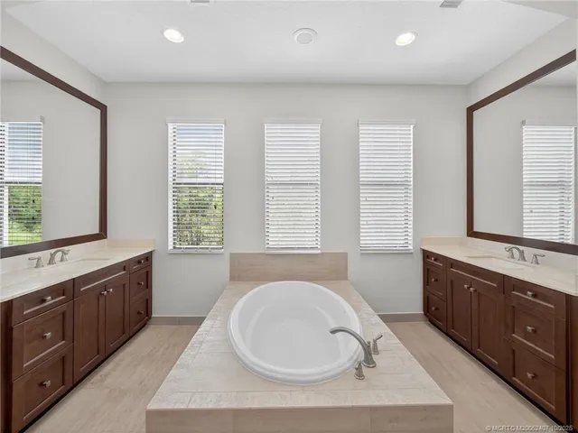 a view of an empty room with a flat screen tv