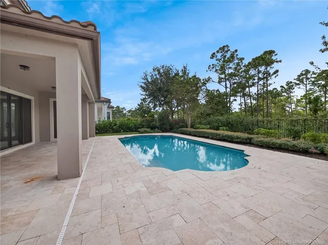 an aerial view of house with yard