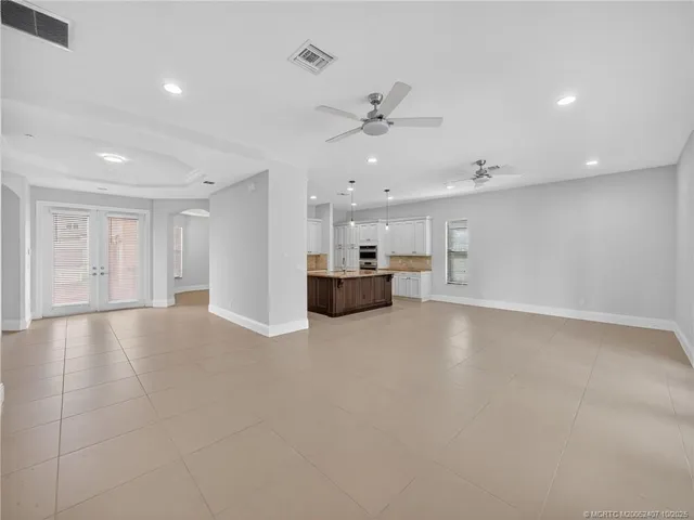 a view of a livingroom with a kitchen