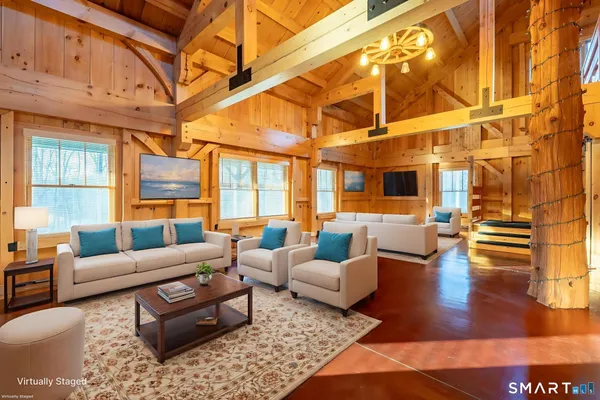 a living room with furniture and a window