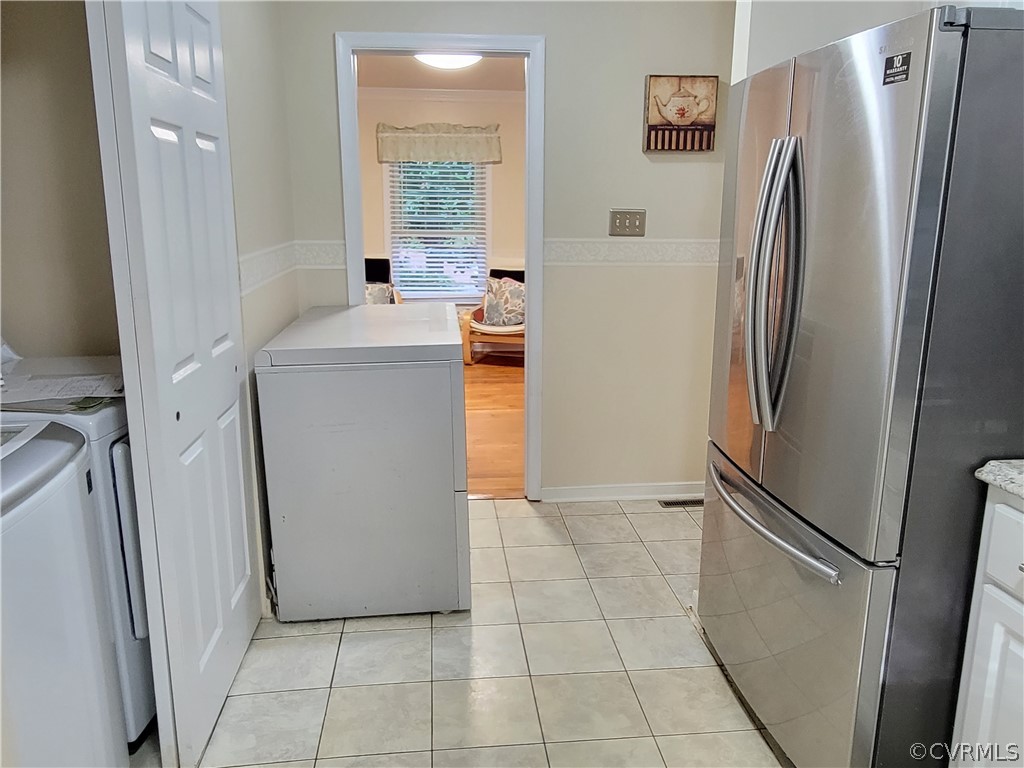 5814 Laurel Trail Road Midlothian, VA 23112 - Photo 15 of 34 a utility room with cabinets washer and dryer