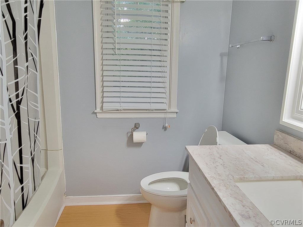 5814 Laurel Trail Road Midlothian, VA 23112 - Photo 17 of 34 a bathroom with a granite countertop sink toilet and shower