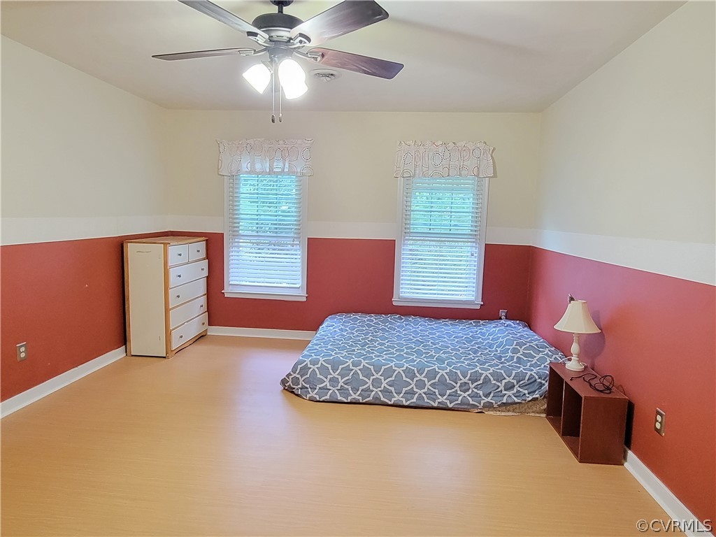 5814 Laurel Trail Road Midlothian, VA 23112 - Photo 21 of 34 a living room with furniture and a chandelier